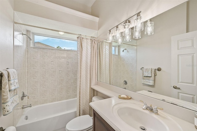 full bathroom featuring vanity, shower / bath combination with curtain, and toilet