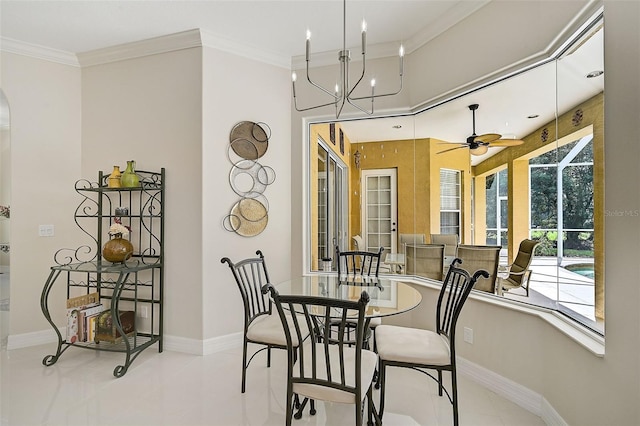 14526 17th Ave E, Bradenton, FL 34212 - dining room featuring tile patterned floors, crown molding, baseboards, arched walkways, and ceiling fan