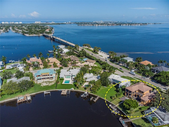 bird's eye view with a water view