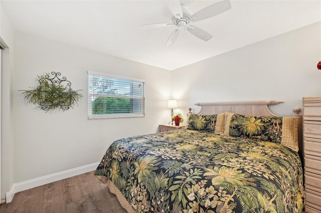 bedroom featuring hardwood / wood-style flooring and ceiling fan