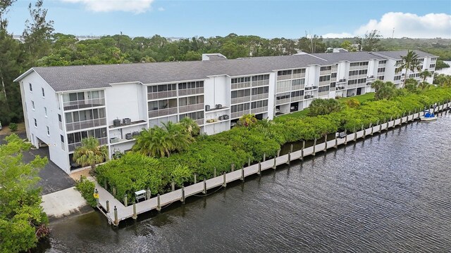 view of building exterior featuring a water view