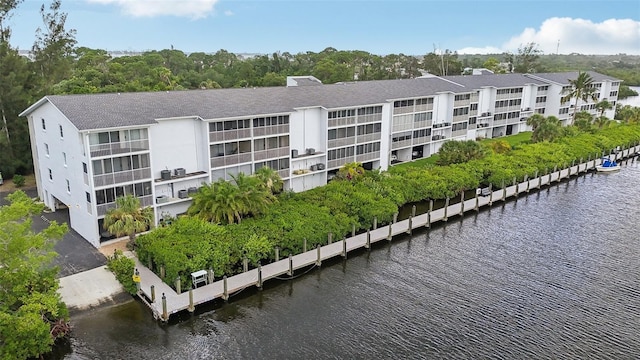 view of building exterior with a water view