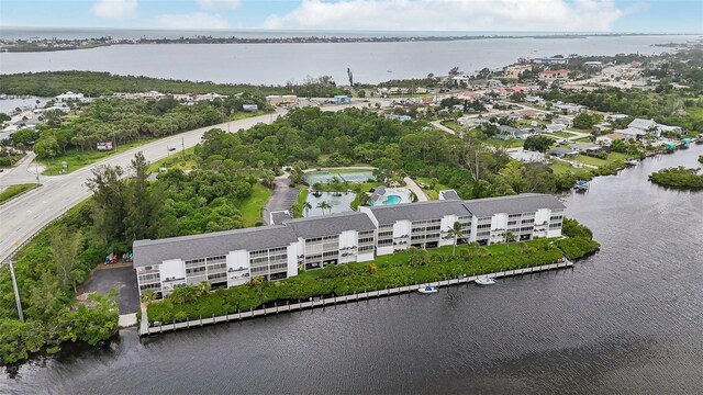 birds eye view of property featuring a water view