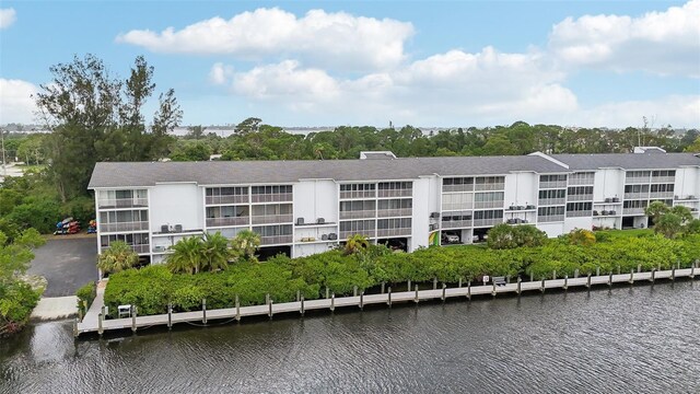 view of property with a water view