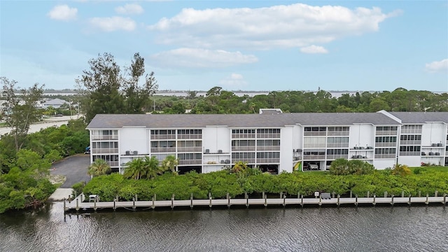 view of building exterior with a water view