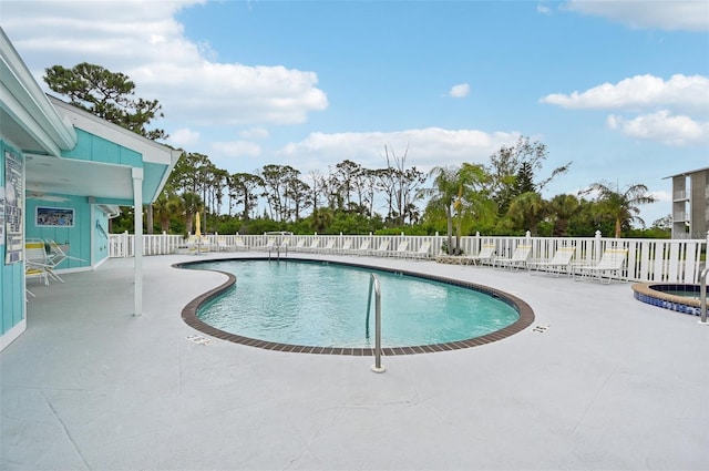 view of pool featuring a patio area