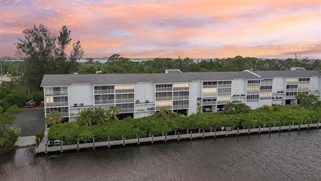 outdoor building at dusk with a water view