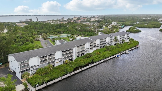 bird's eye view with a water view