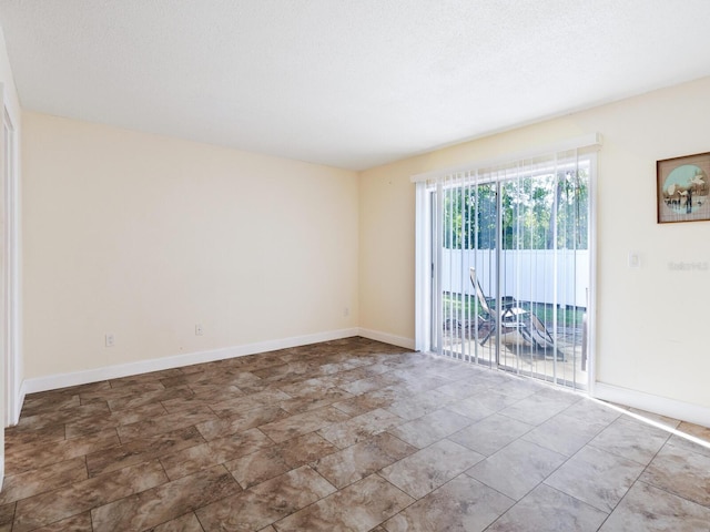 view of tiled empty room