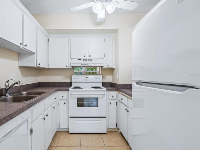 kitchen with white cabinets, white appliances, sink, light tile patterned floors, and ceiling fan