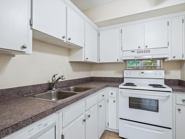 kitchen featuring white cabinets, white appliances, and light tile patterned floors