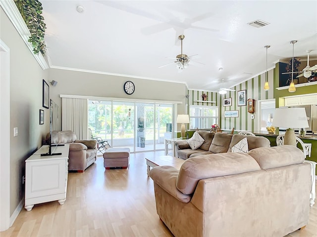 living room featuring crown molding, ceiling fan, and light hardwood / wood-style floors