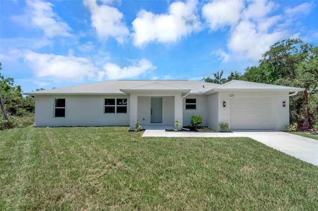 single story home featuring a front lawn and a garage