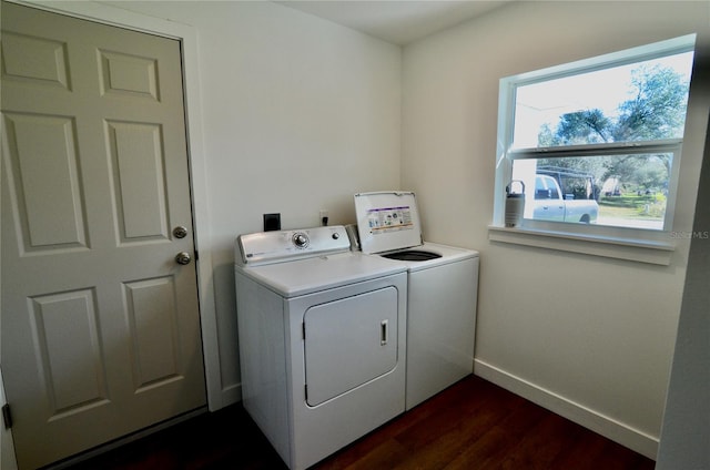 laundry room featuring dark hardwood / wood-style floors and independent washer and dryer