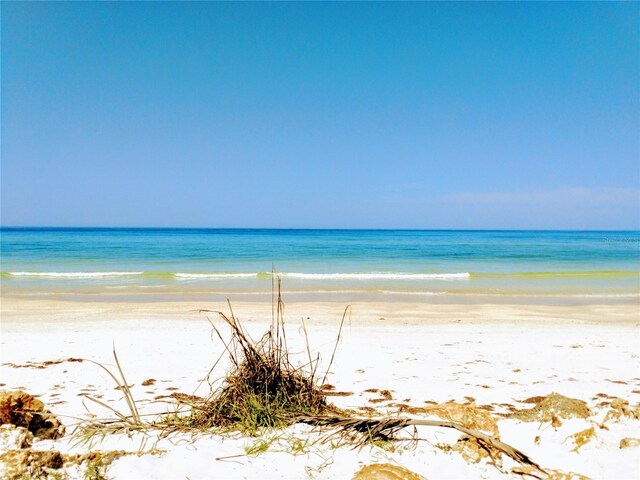 property view of water with a beach view