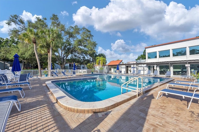 view of pool featuring a patio