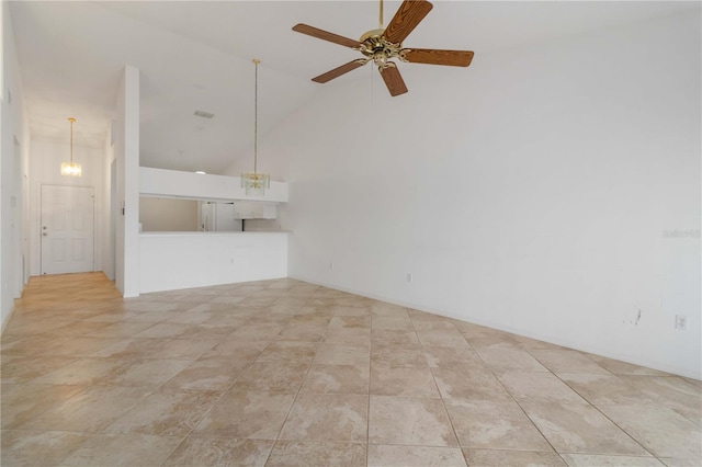 unfurnished living room featuring light tile patterned flooring, ceiling fan, and high vaulted ceiling