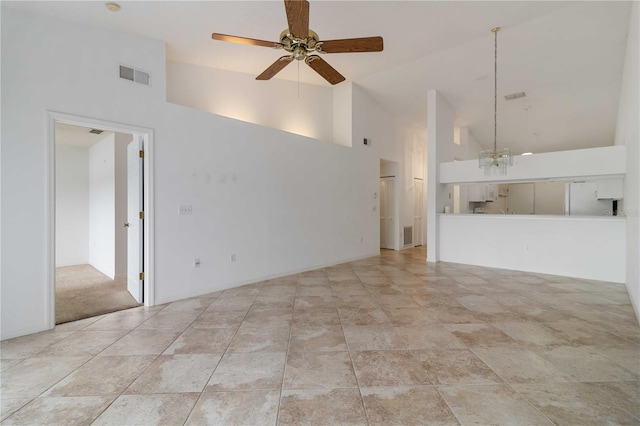 unfurnished living room featuring high vaulted ceiling, ceiling fan, and light tile patterned floors