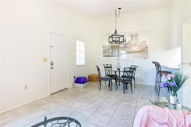 dining area featuring light tile patterned floors