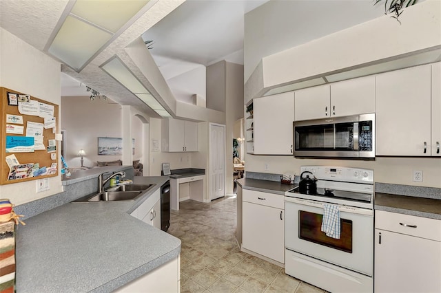 kitchen with electric stove, sink, white cabinets, and black dishwasher