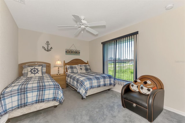 bedroom with ceiling fan and carpet floors