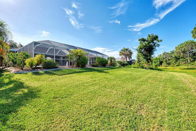 view of yard featuring a lanai