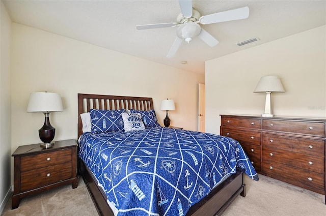 bedroom featuring ceiling fan and light colored carpet