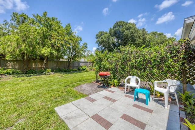 839 40th St, Sarasota, FL 34234 - fenced backyard featuring a patio and grilling area