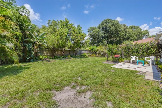 839 40th St, Sarasota, FL 34234 - fenced backyard with a patio area