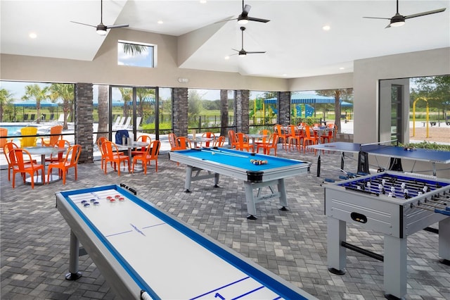 recreation room with plenty of natural light and ceiling fan