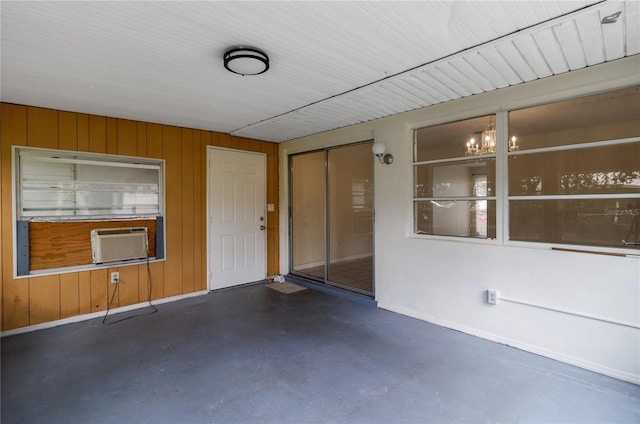 unfurnished sunroom with cooling unit