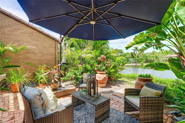 view of patio / terrace featuring a water view