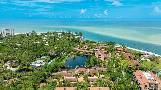 bird's eye view with a residential view and a water view