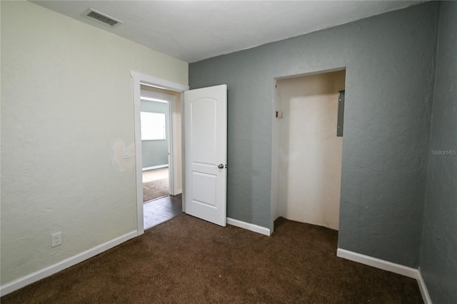 unfurnished bedroom featuring carpet floors