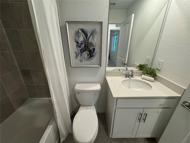 17445 Opal Sand Dr Unit 104, Venice, FL 34293 - bathroom with vanity, a textured wall, toilet, shower / tub combo with curtain, and tile patterned flooring