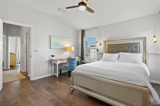 bedroom featuring ceiling fan, dark hardwood / wood-style flooring, and vaulted ceiling