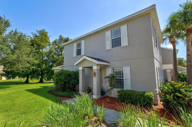 view of front facade with a front lawn