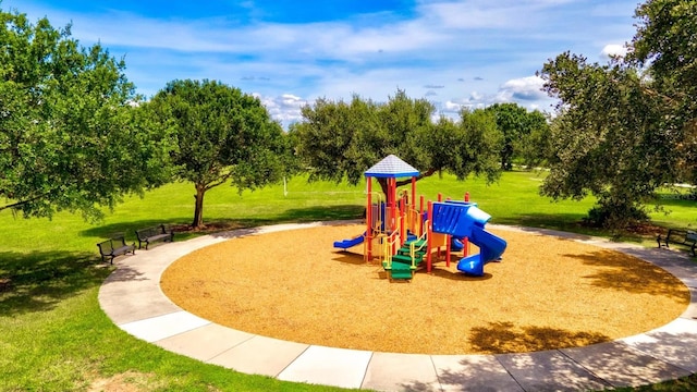 view of jungle gym with a yard