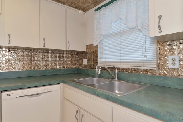 kitchen with white cabinetry, dishwasher, and sink