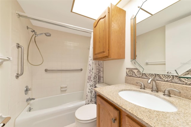 full bathroom featuring vanity, shower / tub combo, and toilet