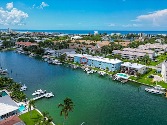 bird's eye view with a water view