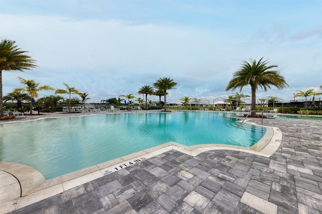 view of pool featuring a patio area