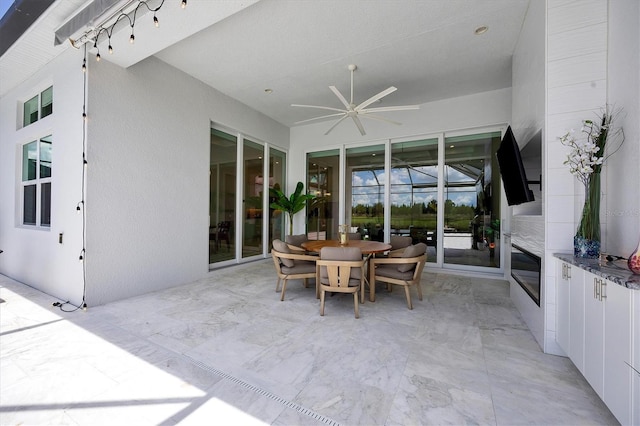 view of patio / terrace featuring ceiling fan