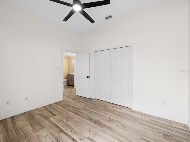 unfurnished bedroom with a closet, ceiling fan, and light wood-type flooring