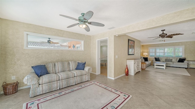 living room with ceiling fan