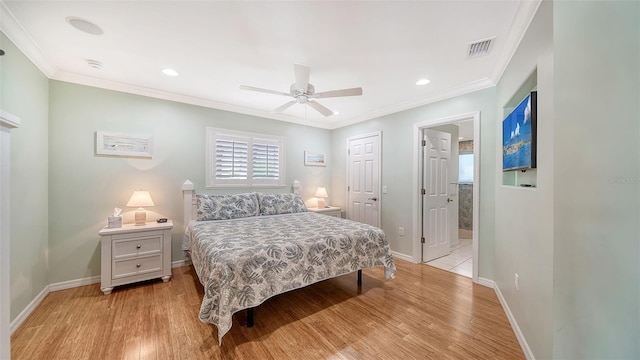 bedroom with ceiling fan, ornamental molding, and light wood-type flooring