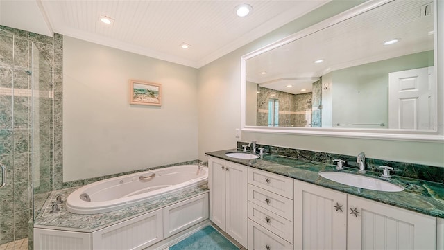 bathroom featuring crown molding, vanity, and independent shower and bath