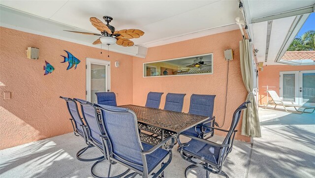 view of patio featuring ceiling fan