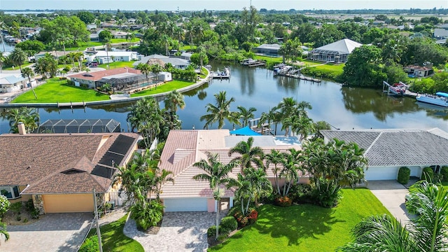 drone / aerial view with a water view