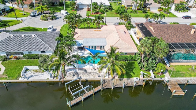 drone / aerial view with a water view